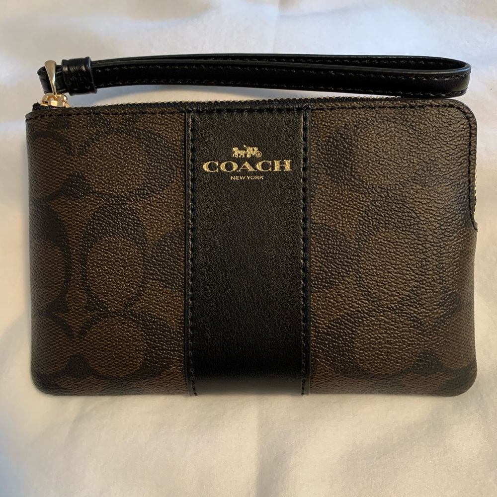 Coach wristlet Signature coated canvas with leather trim